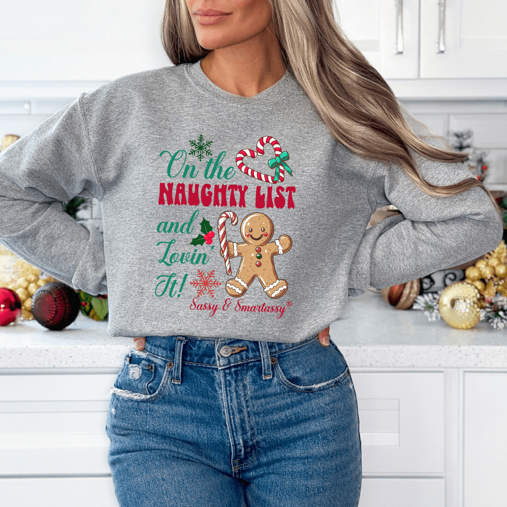 Sassy & Smartassy® "On the Naughty List and Lovin’ It!" Women's Christmas Sweatshirt - Funny Graphic Tee by Sasshole® Clothing