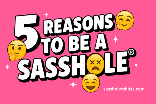 5 Reasons to Be a Sasshole® blog banner in bold white letters on hot pink with emojis – funny sassy clothing brand SassholeTShirts.com.
