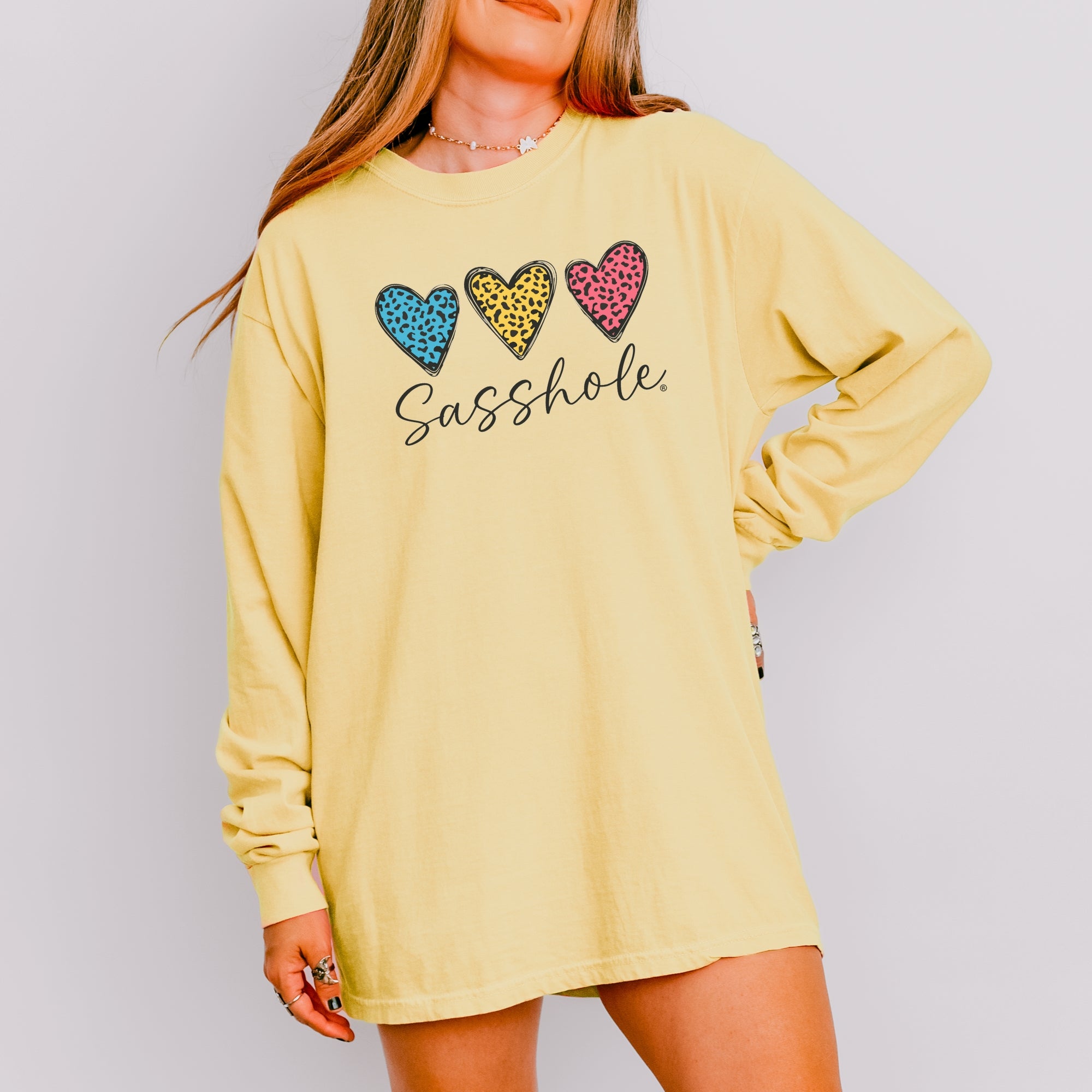 Image of Sasshole® Women’s Comfort Colors® Long Sleeve Tee – “Triple Heart” Funny Graphic T-Shirt, Cozy Statement Shirt