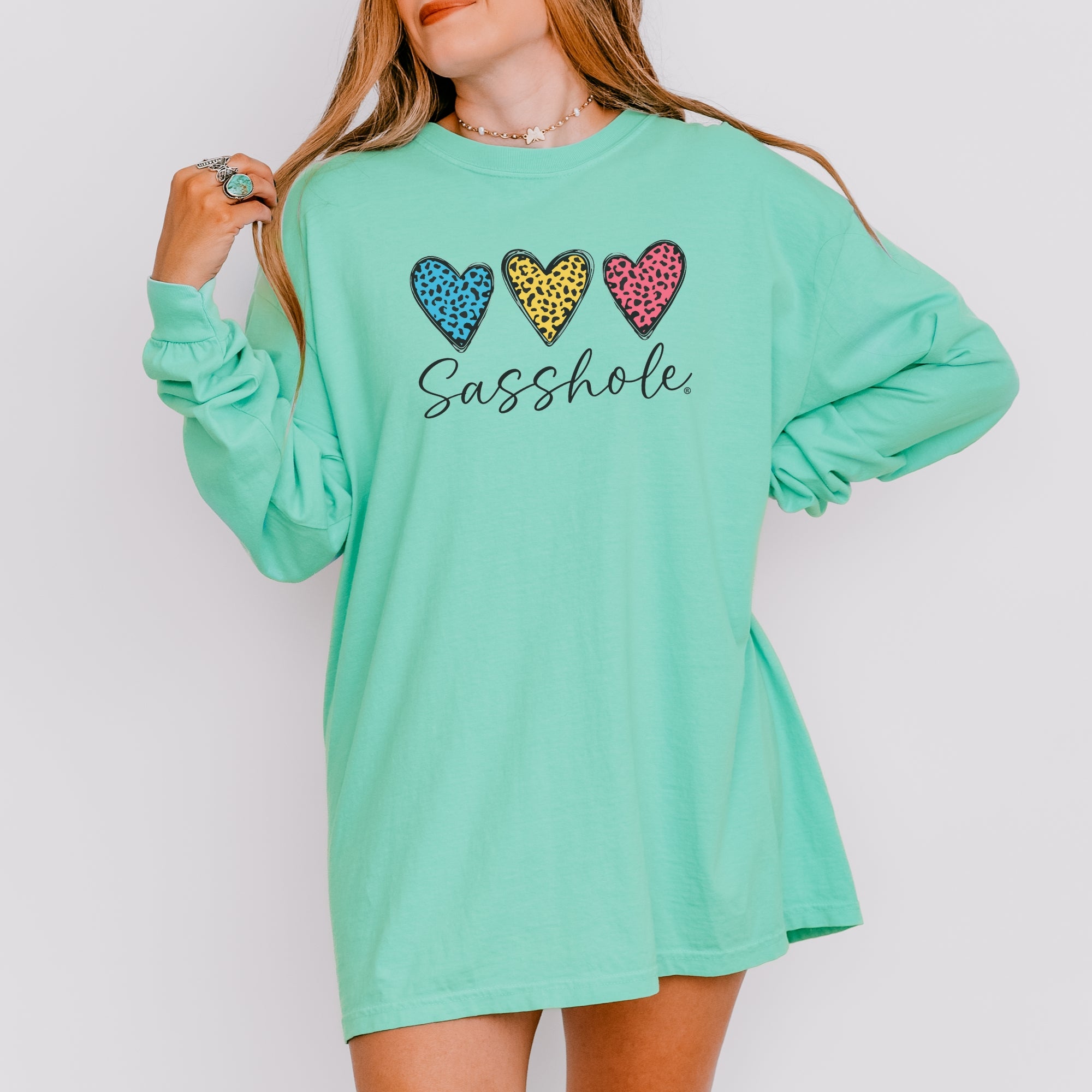 Image of Sasshole® Women’s Comfort Colors® Long Sleeve Tee – “Triple Heart” Funny Graphic T-Shirt, Cozy Statement Shirt