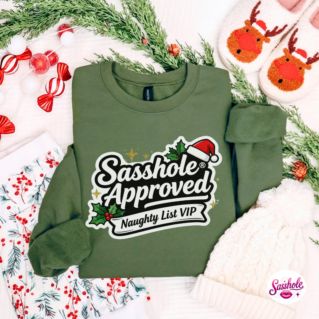 Image of Green sweatshirt with 'Sasshole Approved Naughty List VIP' text on a festive background