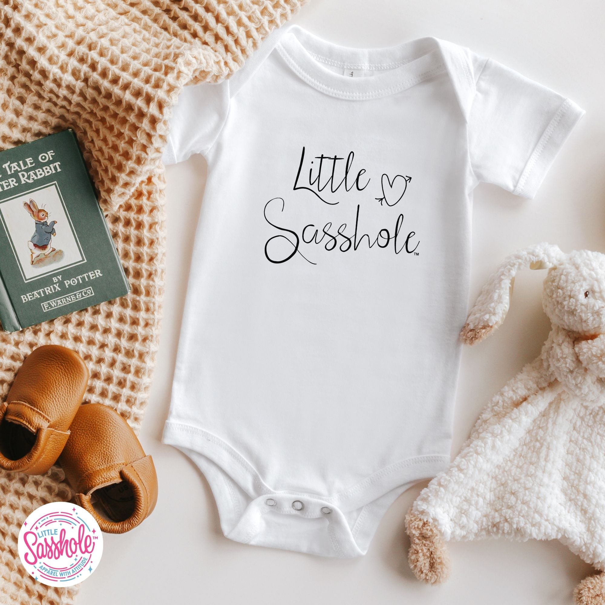 Little Sasshole™ Signature Baby Onesie®: Where Sass Begins - Funny Graphic Tee by Sasshole® Clothing