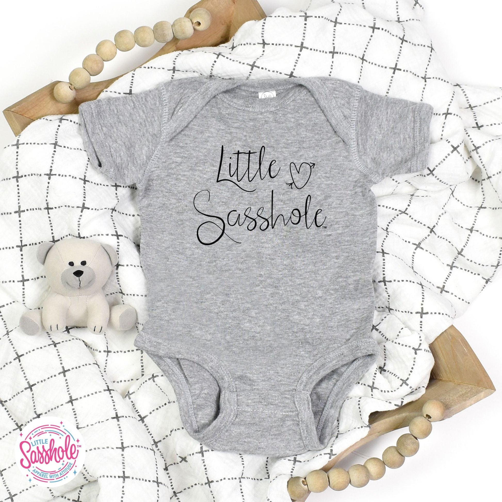 Little Sasshole™ Signature Baby Onesie®: Where Sass Begins - Funny Graphic Tee by Sasshole® Clothing