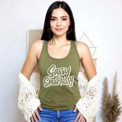 Image of Woman wearing a green tank top with 'Sassy & Smartassy' text, standing against a plain background.